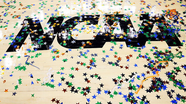 Confetti is seen on the NCAA logo after the Kentucky Wildcats defeat the Kansas Jayhawks 67-59 in the championship game of the 2012 NCAA Division I Men's Basketball Tournament at the Mercedes-Benz Superdome on April 2, 2012, in New Orleans.