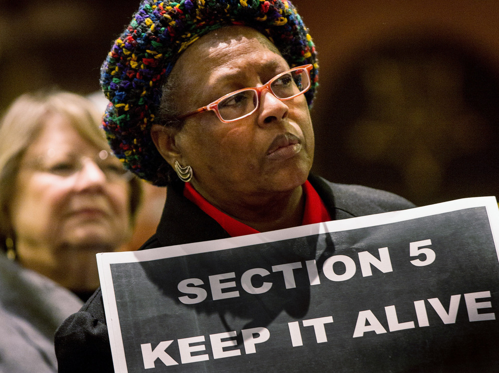 A supporter of the Voting Rights Act attends a rally Columbia, S.C., on Tuesday.