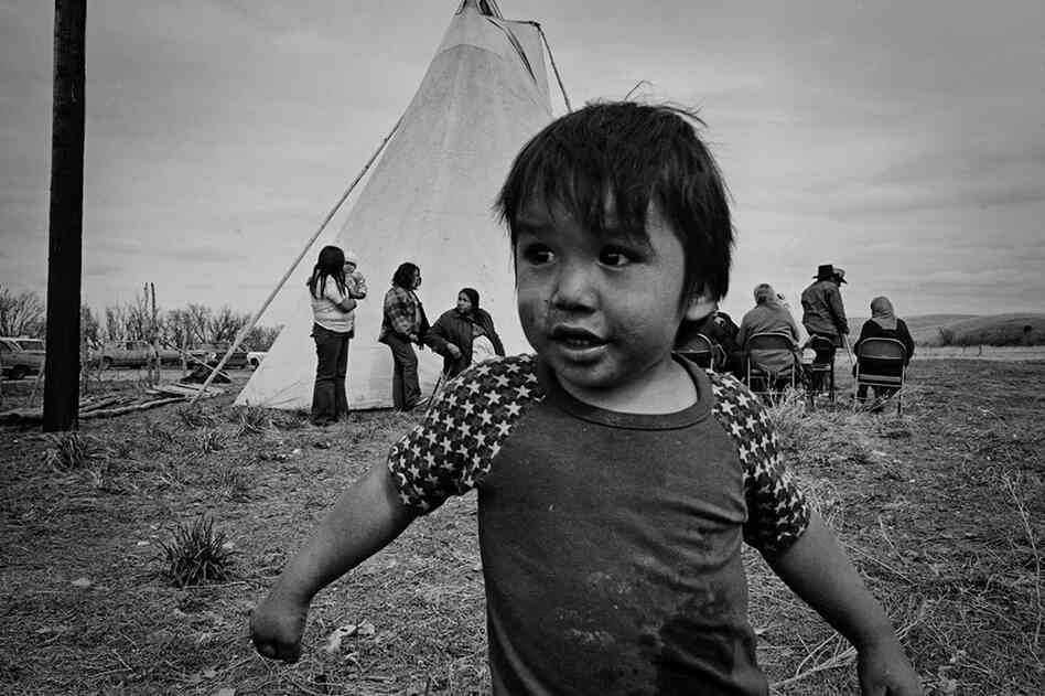 The funeral for Frank Clearwater, one of the two Native Americans who died in the conflict.