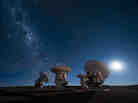 Don't panic! The end of the Universe (as we know it) isn't likely to hit us for billions of years, if it comes at all. Pictured: the Milky Way rises above the ESO's ALMA facility in Chile. Don't panic! The end of the Universe (as we know it) isn't likely to hit us for billions of years, if it comes at all. Pictured: the Milky Way rises above the ESO's ALMA facility in Chile.