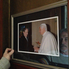 Bernie McDaid keeps a framed photo of his meeting with Pope Benedict by his front door. "It was a tough moment," McDaid says.