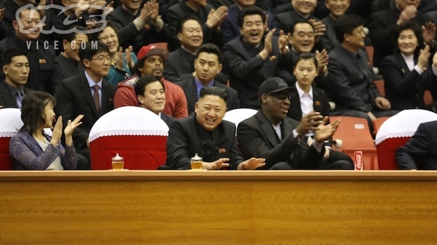 North Korean Leader Kim Jong Un, seated next to former NBA star Dennis Rodman (in black cap), at a basketball game Thursday in Pyongyang.
