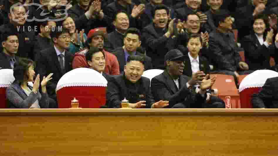 North Korean Leader Kim Jong Un, seated next to former NBA star Dennis Rodman (in black cap), at a basketball game Thursday in Pyongyang.