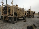 A pair of mine-resistant, ambush-protected vehicles are lined up for a convoy to Kandahar Airfield. One of the trucks broke down before leaving Forward Operating Base Frontenac. The unit has to move out 50 vehicles from the compound. A pair of mine-resistant, ambush-protected vehicles are lined up for a convoy to Kandahar Airfield. One of the trucks broke down before leaving Forward Operating Base Frontenac. The unit has to move out 50 vehicles from the compound.