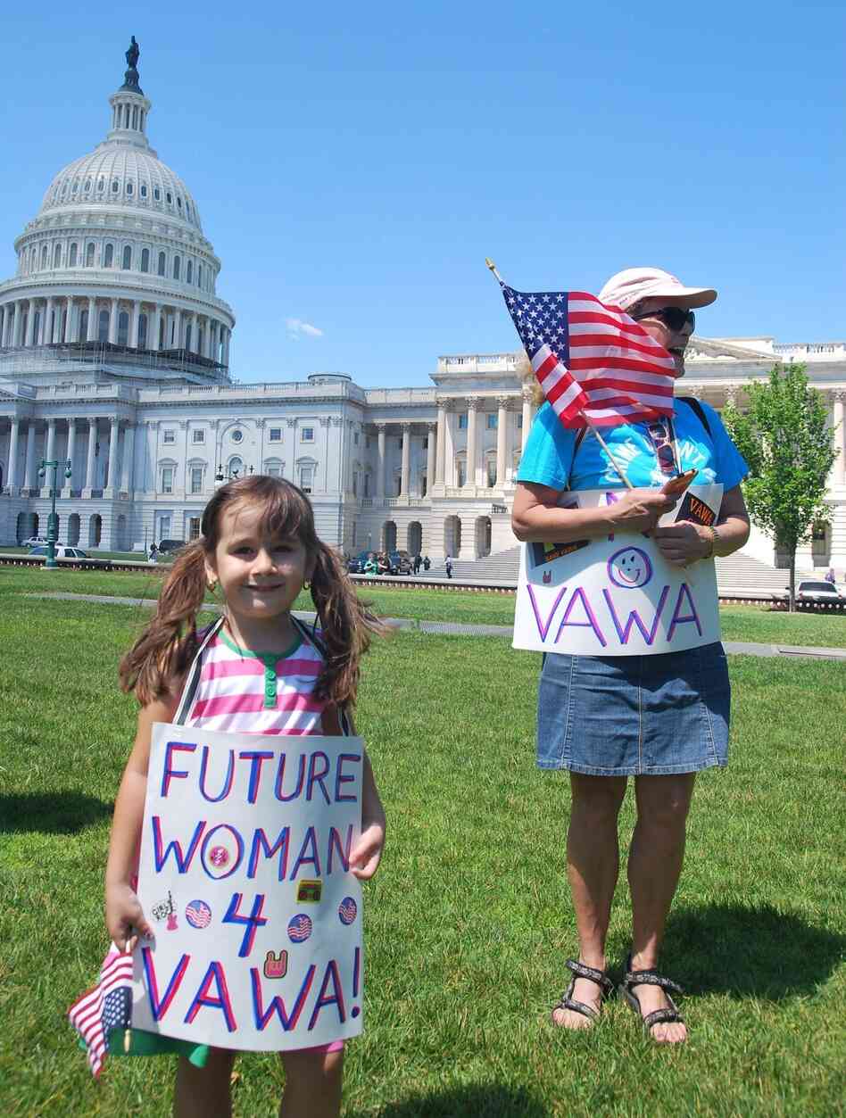 Supporters of the Violence Against Women Act rally in front of the U.S. Capitol last June. On Thursday, the House passed a reauthorization measure.