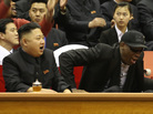 Kim Jong Un and Dennis Rodman watch North Korean and U.S. players in an exhibition basketball game at an arena in Pyongyang on Thursday. Kim Jong Un and Dennis Rodman watch North Korean and U.S. players in an exhibition basketball game at an arena in Pyongyang on Thursday.