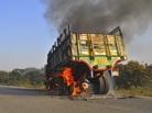 A truck burns on a street outside Bangladesh's capital, Dhaka, on Thursday. Violence erupted, and dozens have been killed, after a court sentenced an Islamist leader to the death penalty for crimes dating to the country's 1971 war of independence. A truck burns on a street outside Bangladesh's capital, Dhaka, on Thursday. Violence erupted, and dozens have been killed, after a court sentenced an Islamist leader to the death penalty for crimes dating to the country's 1971 war of independence.