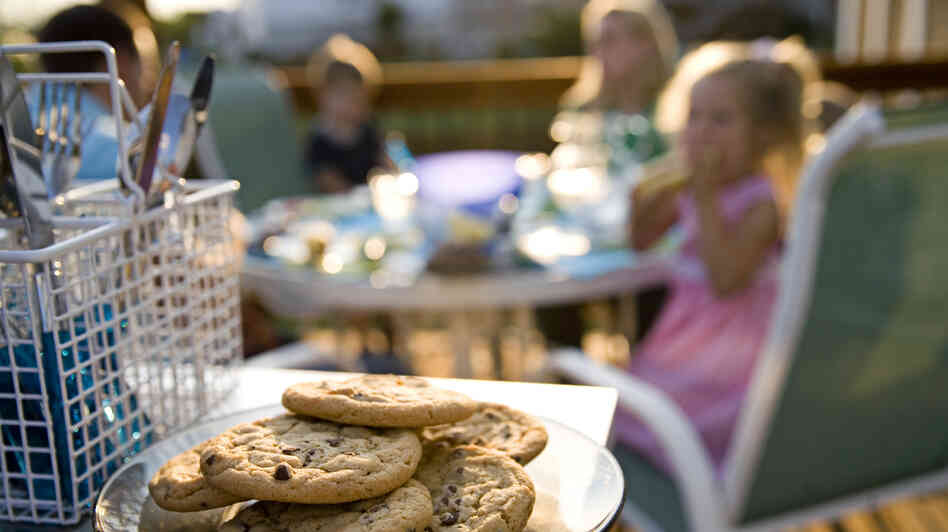Experts say positive encouragements work better than dinnertime rules like "no second helpings" to get kids to eat some foods. Experts say positive encouragements work better than dinnertime rules like "no second helpings" to get kids to eat some foods.