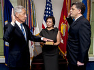 As his wife Lilibet holds the Bible, Chuck Hagel (L) is sworn into office on Feb. 27, 2013. As his wife Lilibet holds the Bible, Chuck Hagel (L) is sworn into office on Feb. 27, 2013.