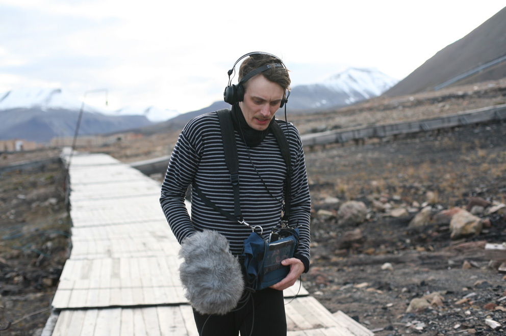 Efterklang's singer, Casper Clausen, records the sound of his footsteps on a long boardwalk running out of town. The sound can be heard in the opening of the song 