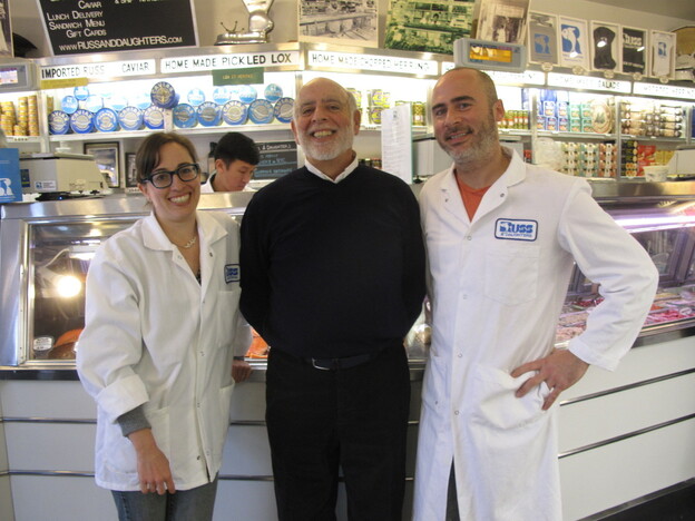 Mark Russ Federman (center) stands with the next generation of Russ and Daughters owners: his daughter Nikki and his nephew Josh Russ Tupper.