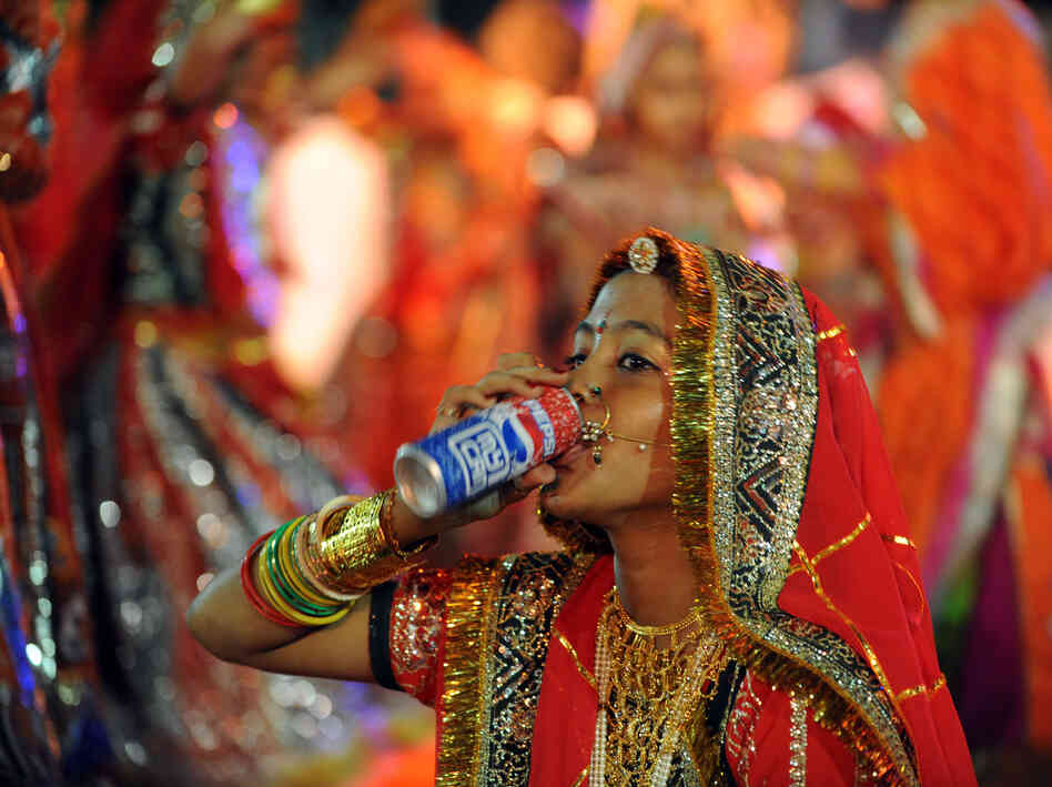 A performer drinks a soda in Ahmedabad, India in 2010. A study found that rising diabetes prevalence in countries like India is strongly tied to sugar consumption. A performer drinks a soda in Ahmedabad, India in 2010. A study found that rising diabetes prevalence in countries like India is strongly tied to sugar consumption.