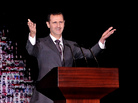 Syrian President Bashar Assad speaks at the Opera House in Damascus, Syria, on Jan. 6. In an interview with Britain's Sunday Times, Assad said that only the Syrian people can tell him when to go. Syrian President Bashar Assad speaks at the Opera House in Damascus, Syria, on Jan. 6. In an interview with Britain's Sunday Times, Assad said that only the Syrian people can tell him when to go.