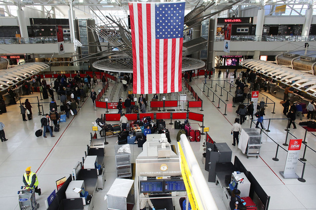 People wait in a security line at John F. Kennedy Airport on February 28, 2013 in New York City.
