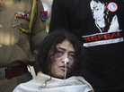 Activist Irom Sharmila is flanked by a policeman, left, and a supporter, on Monday in New Delhi. Sharmila has been on a hunger strike for 12 years to protest an Indian law that suspends many human rights protections in areas of conflict. Activist Irom Sharmila is flanked by a policeman, left, and a supporter, on Monday in New Delhi. Sharmila has been on a hunger strike for 12 years to protest an Indian law that suspends many human rights protections in areas of conflict.