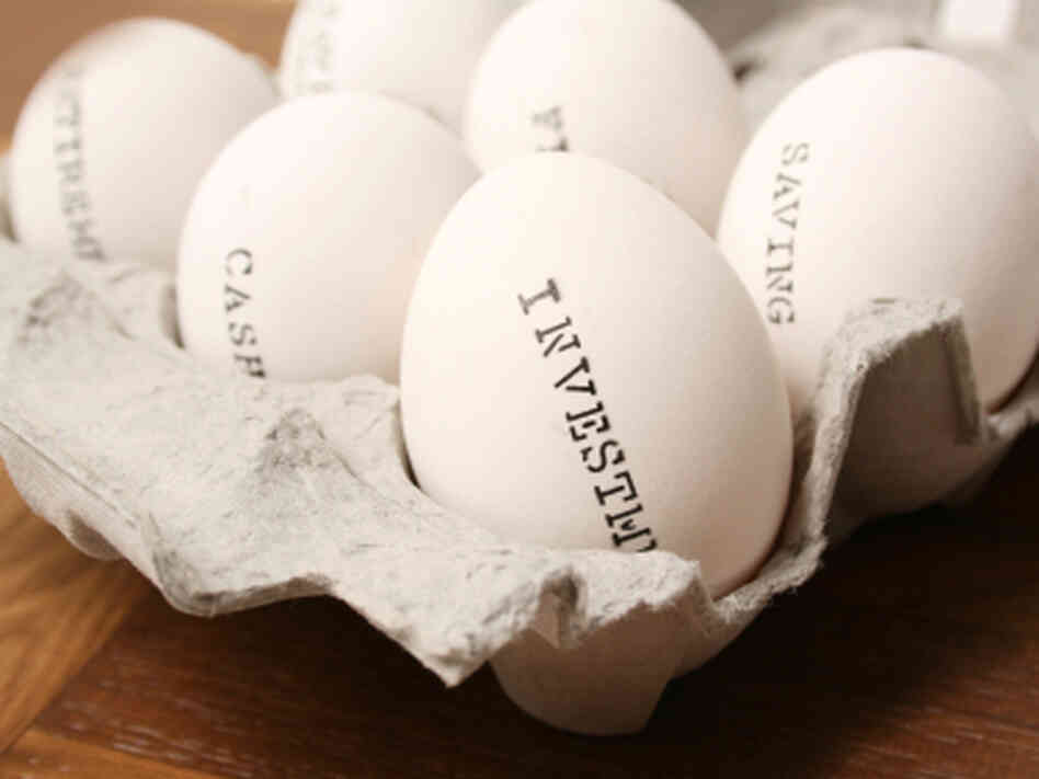 Eggs labeled as cash, investments and savings. Eggs labeled as cash, investments and savings.