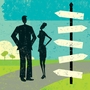 Two figures stand near a signpost.
