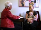 Colorado midwife Dian Sparling, 71, meets with Lisa Eldridge and her baby, Colton James. Colorado midwife Dian Sparling, 71, meets with Lisa Eldridge and her baby, Colton James.