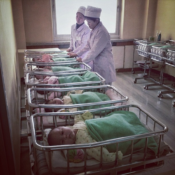 "North Korean babies rest in a row of cribs at the #Pyongyang Maternity Hospital."