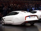 Two new Volkswagen hybrid XL1 model cars are displayed during a preview of Volkswagen ahead of the Geneva Car Show in Geneva. Two new Volkswagen hybrid XL1 model cars are displayed during a preview of Volkswagen ahead of the Geneva Car Show in Geneva.
