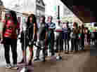 SXSW festival-goers line up at The Parish on Sixth Street in Austin for NPR Music's day party March 15, 2012.