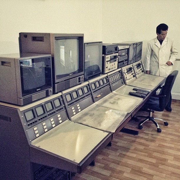 "A North Korean doctor and a bank of video monitors inside a #Pyongyang hospital."