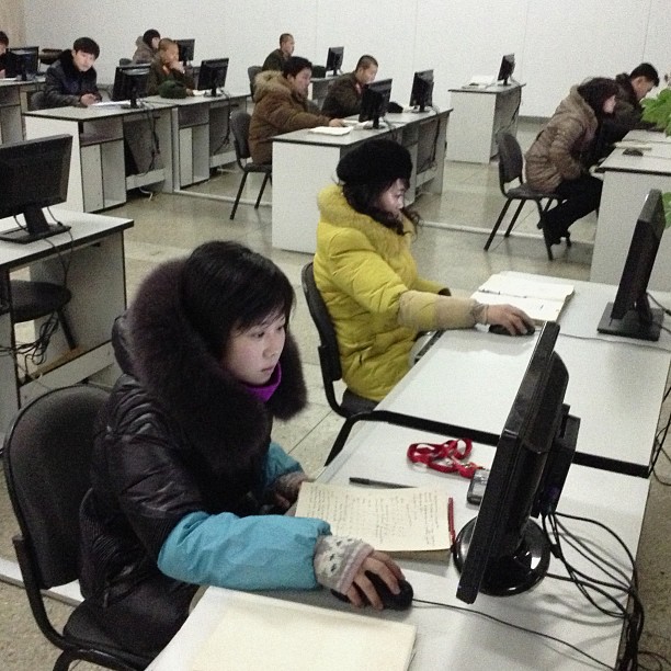 "When Google chairman Eric Schmidt traveled to North Korea in January, I went with him to this massive library in #Pyongyang called The Grand People's Study House and met these students, in winter hats and gloves, working at computers connected to the local intranet. iPod touch photo from Jan. 9, 2013."