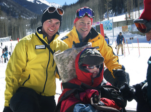 Tilghman with his instructors Ché Pirozak-Lillick (left) and Stagg after the first day of ski lessons.