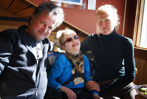 The Logan family — Philip, Tilghman and Barbara — traveled from New York City to New Mexico to vacation at a ski lodge that can accommodate Tilghman's needs. The Logan family — Philip, Tilghman and Barbara — traveled from New York City to New Mexico to vacation at a ski lodge that can accommodate Tilghman's needs.