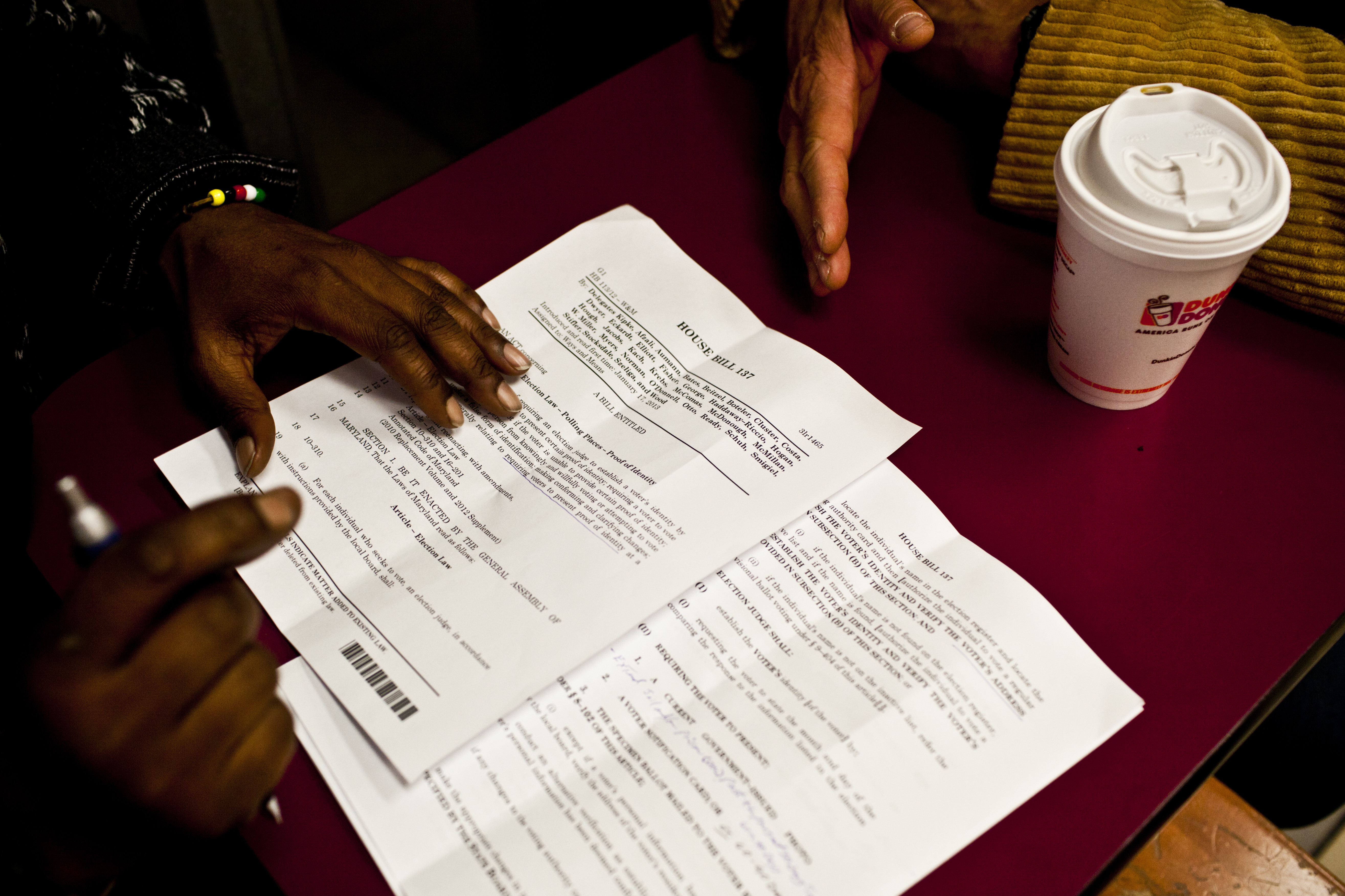 Behler and Simmons take up issues on behalf of the homeless population. Here, they discuss Maryland House Bill 137, which calls for proof of identification at polling places, before going to a hearing in Annapolis. Simmons argues that many homeless have lost their IDs but shouldn't be disenfranchised.