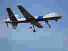 An unmanned drone patrols the U.S.-Canadian border. Attorney General Eric Holder, in a letter to Sen. Rand Paul, R-Ky., said the president could in an "extraordinary circumstance" order a drone strike inside the country.