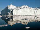An iceberg in or just outside the Ilulissat fjord, which likely calved from Jakobshavn Isbrae, the fastest glacier in western Greenland, in May 2012. Polar ice sheets are now melting three times faster than in the 1990s.