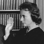 Sandra Day O'Connor is sworn in as an associate justice by Chief Justice Warren Burger on Sept. 25, 1981. Holding two family Bibles is husband John Jay O'Connor.