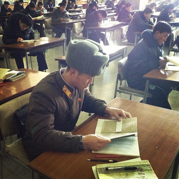 "A North Korean soldier reads at a desk at the Grand People's Study House in #Pyongyang."