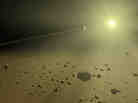 In this illustration, debris along the outer reaches of a planet-forming disk orbits in the glare of a distant sun. In this illustration, debris along the outer reaches of a planet-forming disk orbits in the glare of a distant sun.