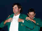 Augusta National says it has long maintained ownership of the green jackets it awards the winners of the Masters Tournament. Here, Bubba Watson accepts his jacket after winning last year's event.