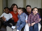 April DeBoer (second from left) sits with her adopted daughter Ryanne, 3, and Jayne Rowse and her adopted sons Jacob, 3, and Nolan, 4, at their home in Hazel Park, Mich., on Tuesday. April DeBoer (second from left) sits with her adopted daughter Ryanne, 3, and Jayne Rowse and her adopted sons Jacob, 3, and Nolan, 4, at their home in Hazel Park, Mich., on Tuesday.