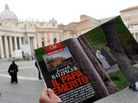 In Vatican City's St. Peter's Square on Wednesday, a man looked at the Italian magazine Chi's photo of former Pope Benedicxt XVI — the first such image since he stepped down last week. In Vatican City's St. Peter's Square on Wednesday, a man looked at the Italian magazine Chi's photo of former Pope Benedicxt XVI — the first such image since he stepped down last week.