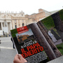In Vatican City's St. Peter's Square on Wednesday, a man looked at  the Italian magazine Chi's photo of former Pope Benedicxt XVI — the first such image since he stepped down last week.
