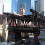 The south leaf section of the Wells Street Bridge in Chicago has been cut off, and will be floated on the river to make way for the replacement section. The south leaf section of the Wells Street Bridge in Chicago has been cut off, and will be floated on the river to make way for the replacement section.