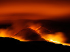 The sky glowed red above Sicily's Mount Etna early Wednesday. The sky glowed red above Sicily's Mount Etna early Wednesday.