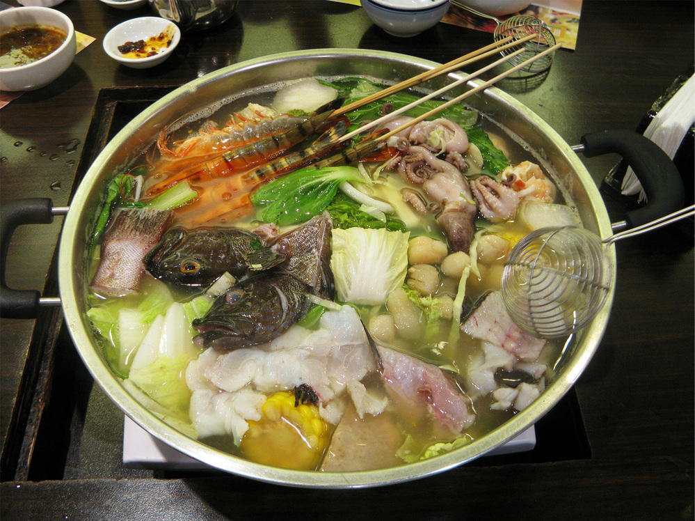 Fish heads and octopus, cooked in winter melon soup with dried scallops.