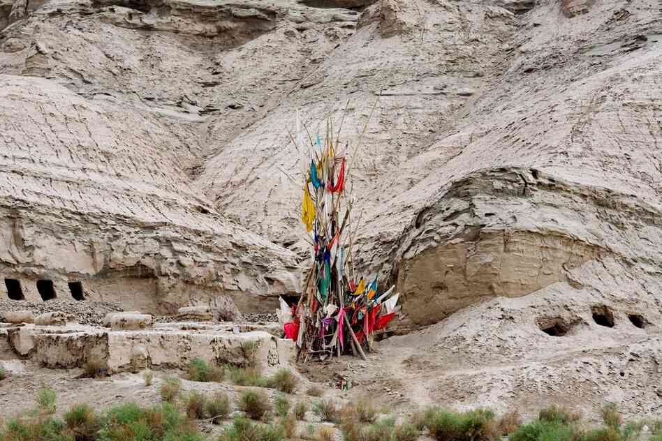 Unrevealed, Site 5 (Six Awaiting), 2009. Future places for burial close to the tomb of a saint are carved out of soft mountain stone.