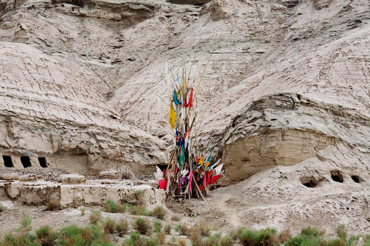 Unrevealed, Site 5 (Six Awaiting), 2009. Future places for burial close to the tomb of a saint are carved out of soft mountain stone.
