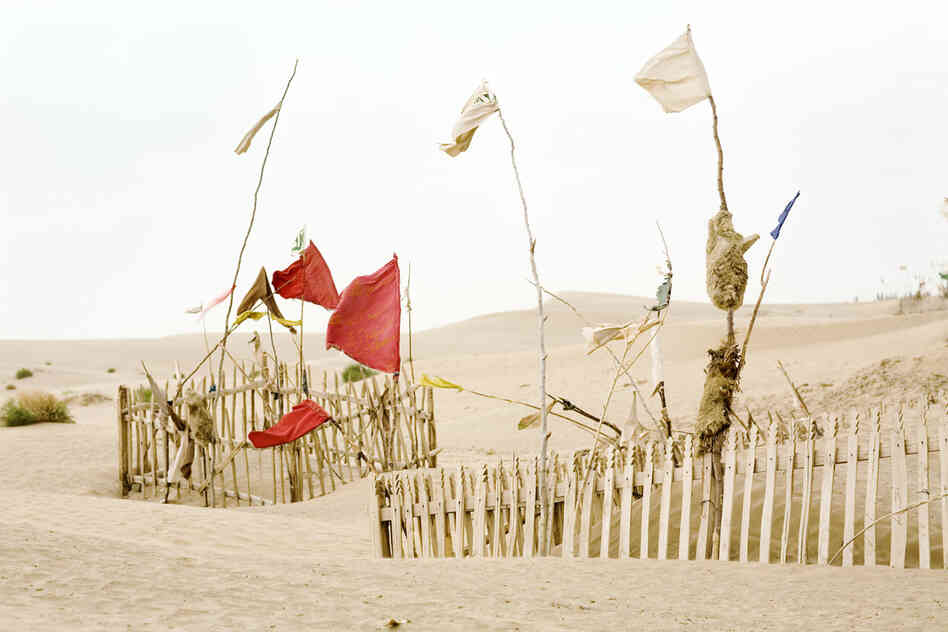 Unrevealed, Site 2 (Red Movement), 2009. Interconnected by wind and sand: tulums, branches, mazars and saints.