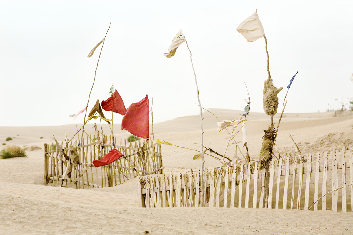 Unrevealed, Site 2 (Red Movement), 2009. Interconnected by wind and sand: tulums, branches, mazars and saints.