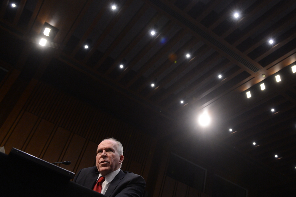 John Brennan testifies during his confirmation hearing before the Senate Intelligence Committee in Washington, on February 7, 2013.