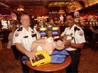 Main Street Station casino security staffers Jim Daugherty (left) and James Boles show off an automated external defibrillator in Las Vegas in 1997. Back then, the idea of putting the devices in casinos to save lives seemed like a long shot. Main Street Station casino security staffers Jim Daugherty (left) and James Boles show off an automated external defibrillator in Las Vegas in 1997. Back then, the idea of putting the devices in casinos to save lives seemed like a long shot.