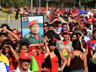 Supporters of late Venezuelan President Hugo Chavez wait in line to see his body lying in state Thursday outside the Military Academy in Caracas, Venezuela. The state funeral will be held Friday. Supporters of late Venezuelan President Hugo Chavez wait in line to see his body lying in state Thursday outside the Military Academy in Caracas, Venezuela. The state funeral will be held Friday.