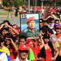 Supporters of late Venezuelan President Hugo Chavez wait in line to see his body lying in state Thursday outside the Military Academy in Caracas, Venezuela. The state funeral will be held Friday.